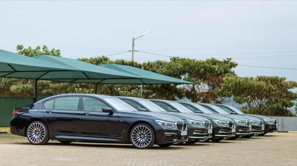 Fleet of black luxury BMW sedans lined up for long-term corporate car rental in Vietnam