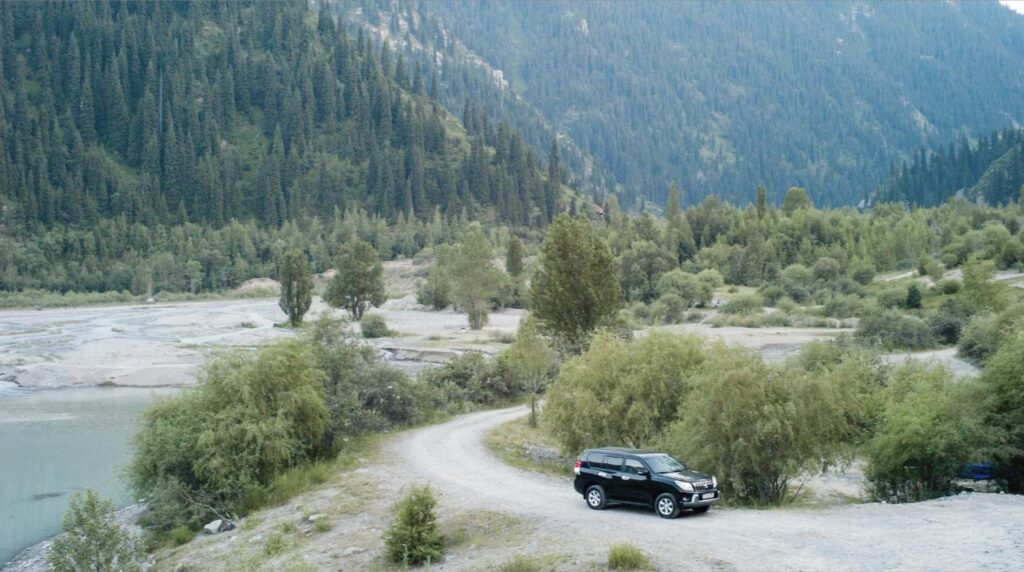Luxury SUV on a scenic mountain road during a tour and leisure travel trip in Vietnam