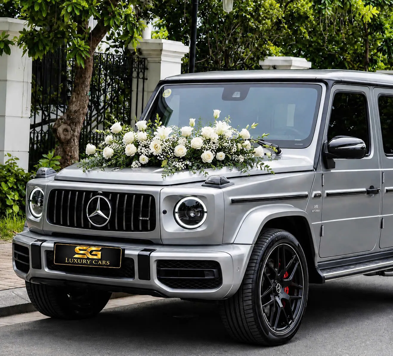 Luxury wedding car rental Vietnam - Mercedes G63 decorated with flowers